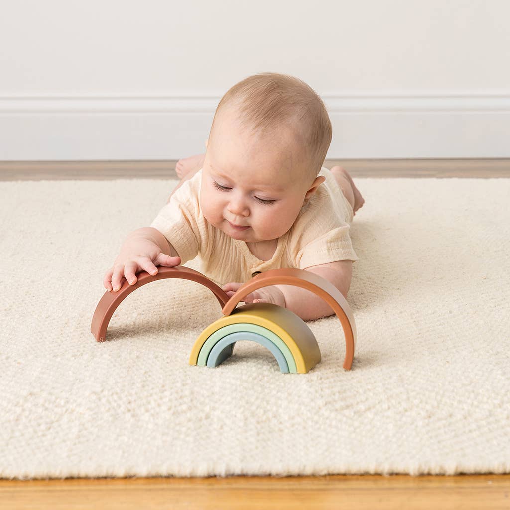 Baby with Rainbow Stack Toy