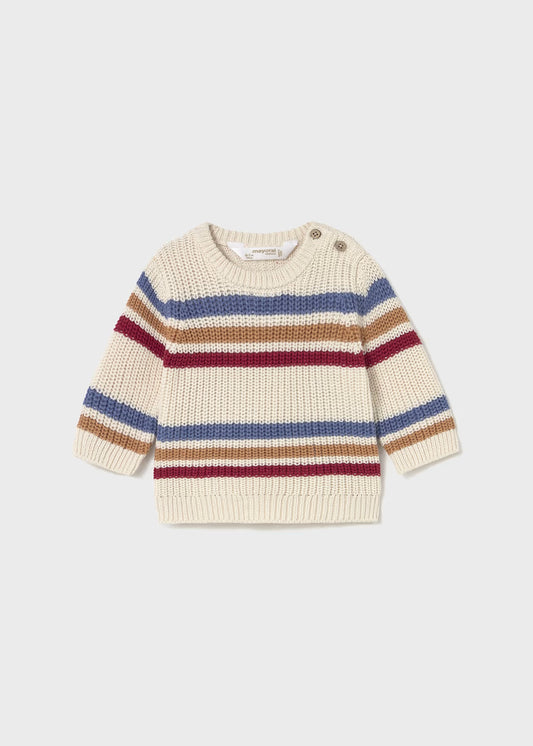 Knitted sweater with multicolor stripes on a light gray background