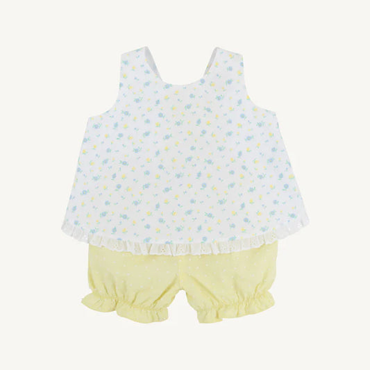 Baby outfit with a white top and yellow bloomers on a white background