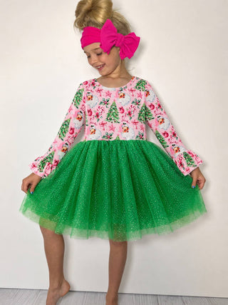 A sleeveless pink dress with a tutu skirt, featuring a crew neckline, perfect for festive occasions.