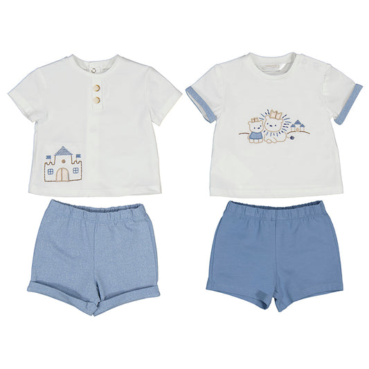 Two-piece baby boy outfit set with white t-shirt with sandcastle embroidery and button details, paired with blue shorts; second t-shirt with animal embroidery, paired with same blue shorts.