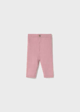 Pink ribbed leggings on a white background