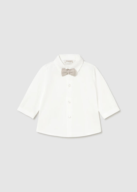 White dress shirt with a bow tie on a light gray background