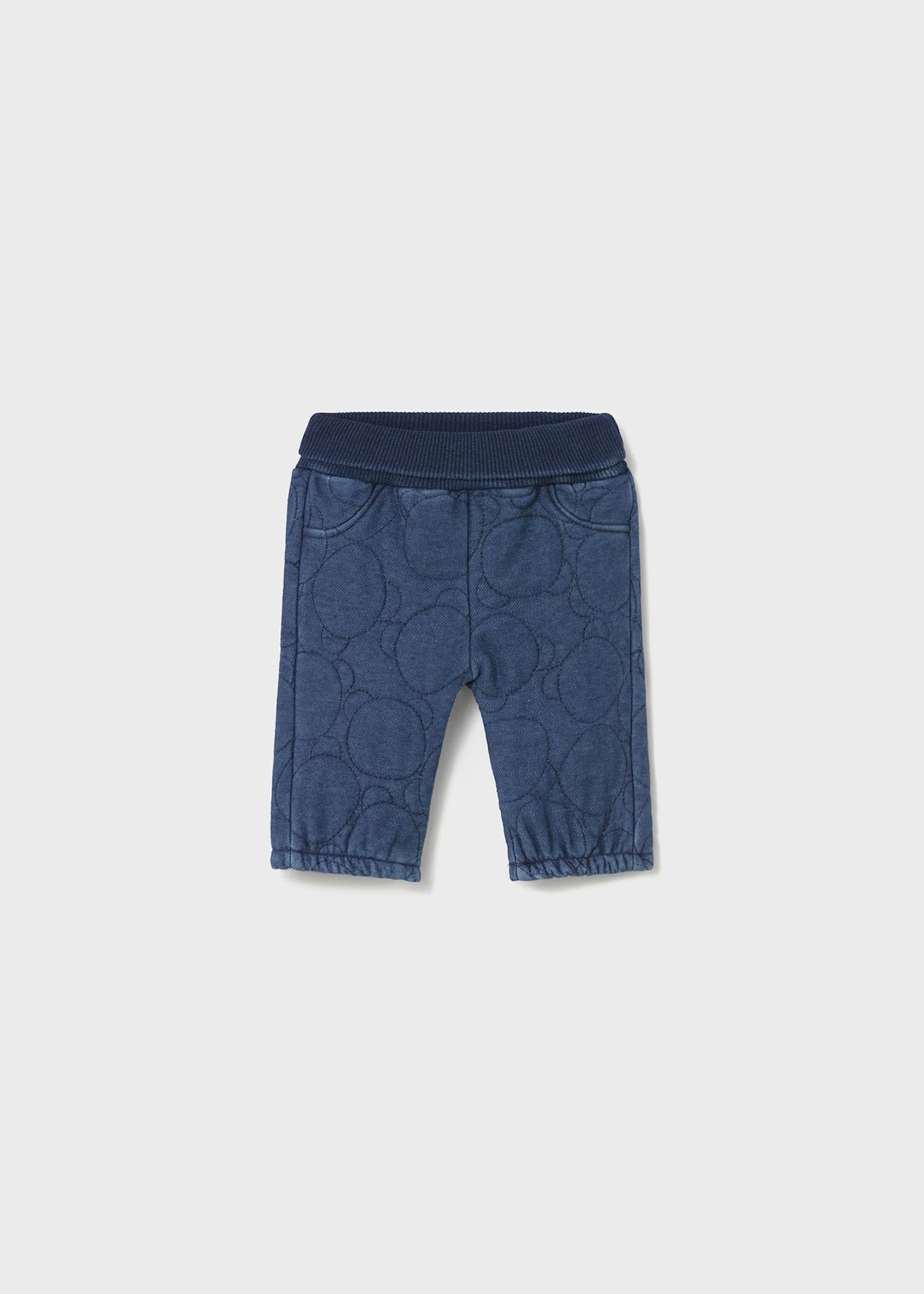 Blue children's pants on a light gray background